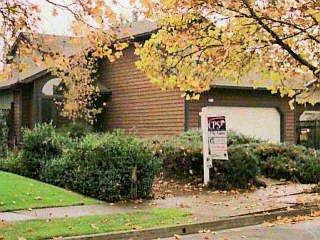 2432 Pinercrest Drive Santa Rosa, CA 95403 - Photo 1 of 1 a front view of a house with garden