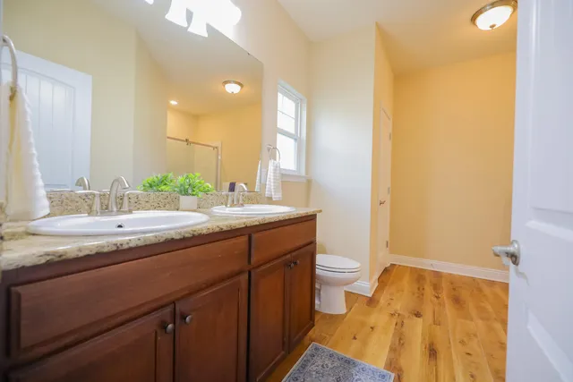 a bathroom with a shower and a shower