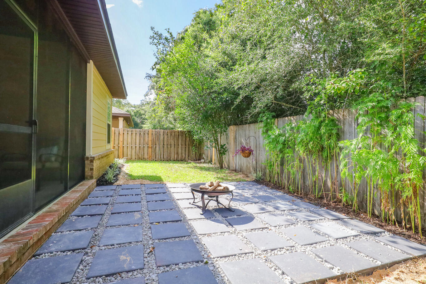 96 Benton Boulevard Freeport, FL 32439 - Photo 31 of 34 a view of a back yard of the house
