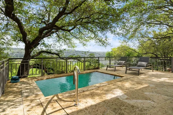 a view of a lake with a bench
