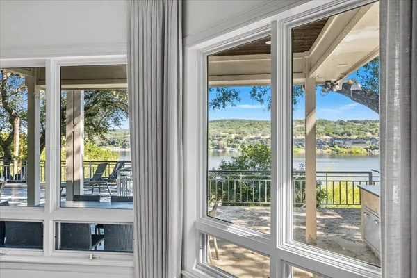 a view of a glass door of the house