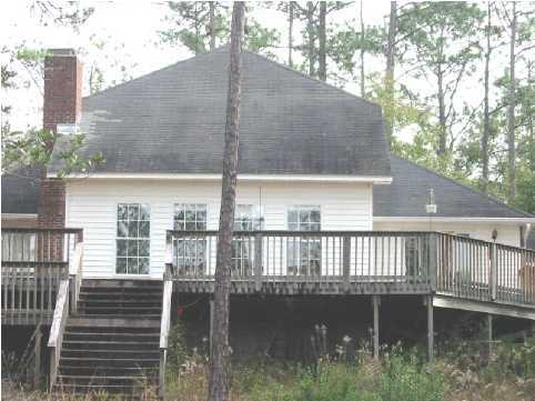 2642 Spring Lake Road DeFuniak Springs, FL 32433 - Photo 4 of 8 a balcony with view of lake