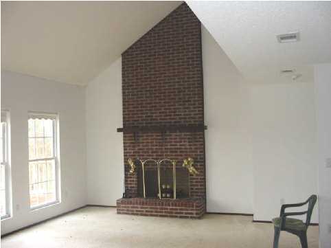 2642 Spring Lake Road DeFuniak Springs, FL 32433 - Photo 5 of 8 a view of fireplace and window