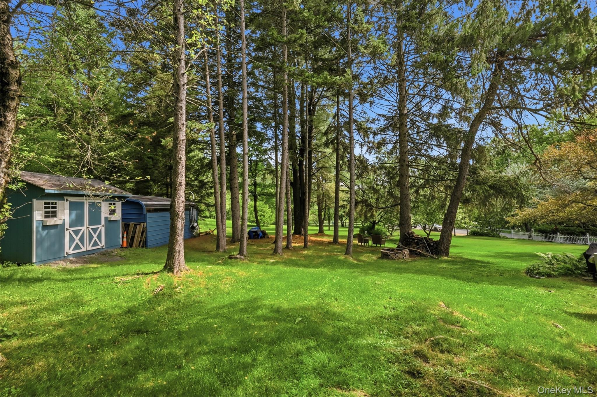 115 Cold Spring Road Liberty, NY 12754 - Photo 21 of 35 Mature trees, shed and grassy yard and 12x12 shed