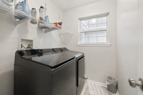 a utility room with dryer and washer