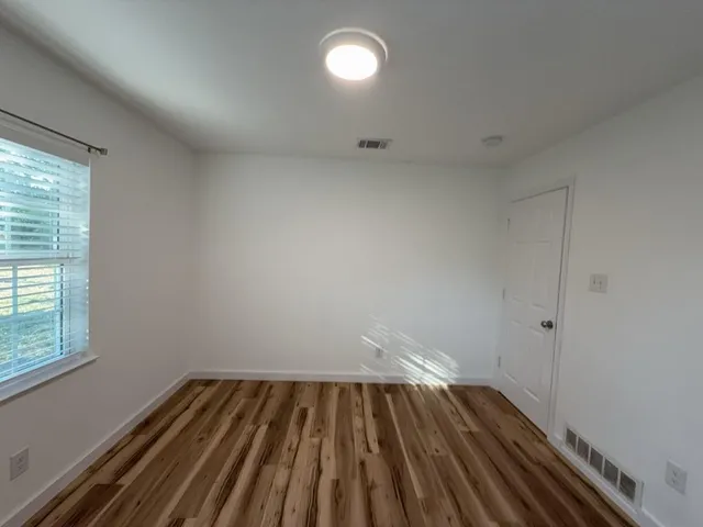 a view of small space with racks on the wall