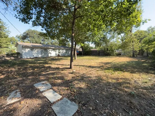 a view of outdoor space and yard
