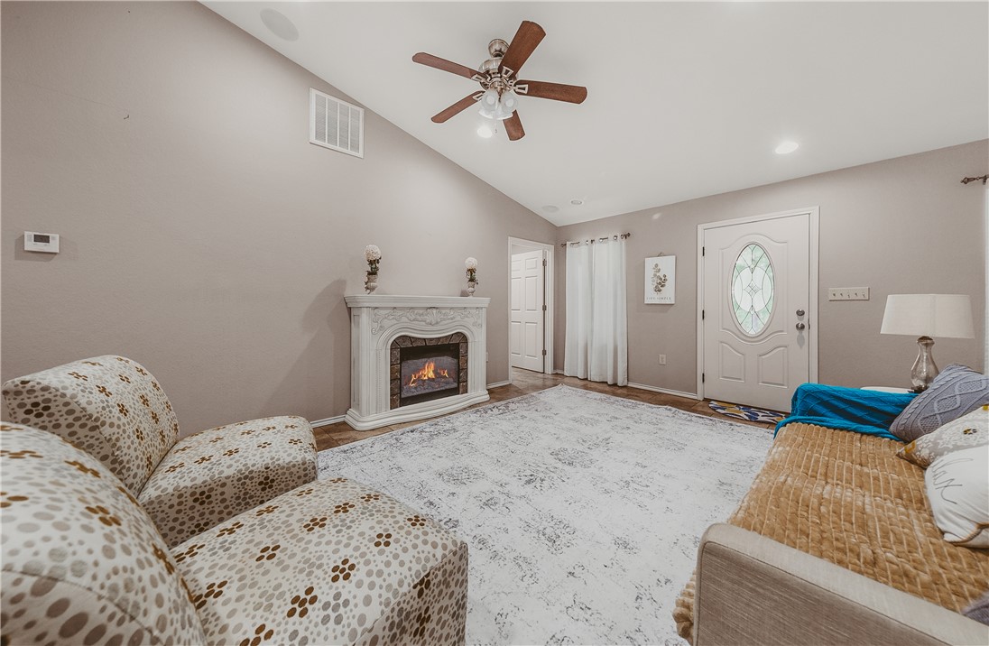 648 Dequeen Lake Road De Queen, AR 71832 - Photo 3 of 46 Spacious living area featuring vaulted ceilings and fireplace