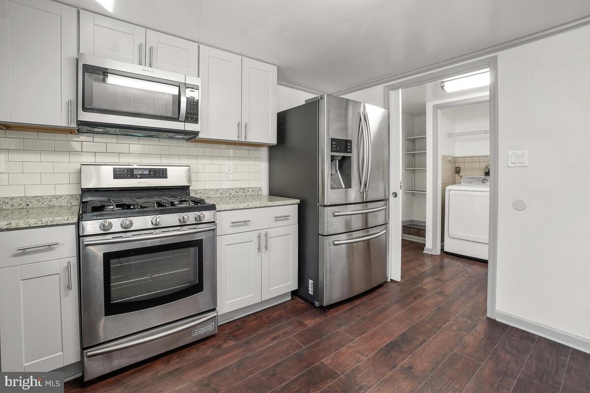 5009 Old Bartholows Road Mount Airy, MD 21771 - Photo 20 of 45 Laundry/Pantry with pocket door to separate
