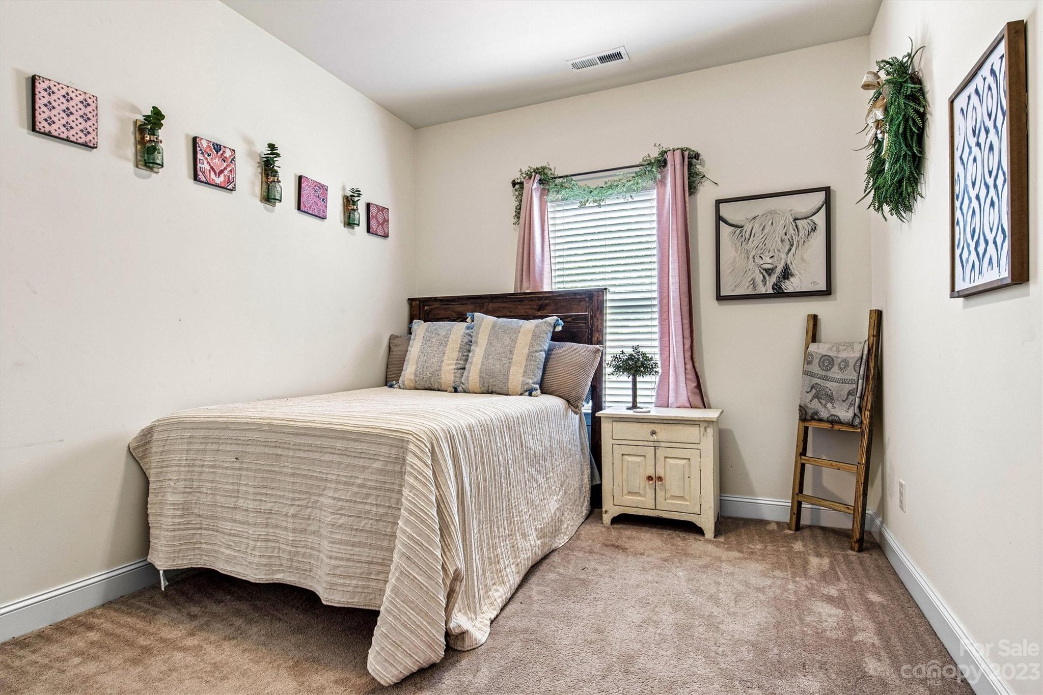 6054 Durango Way Denver, NC 28037 - Photo 16 of 38 a bedroom with a bed and a window