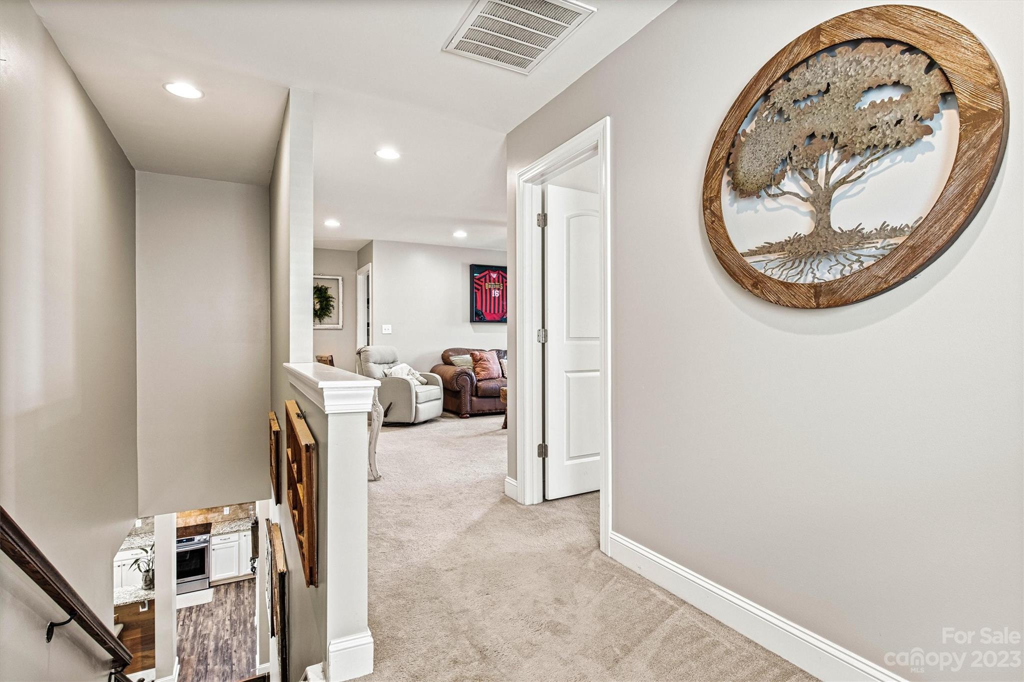 6054 Durango Way Denver, NC 28037 - Photo 18 of 38 a view of a livingroom with furniture and a mirror