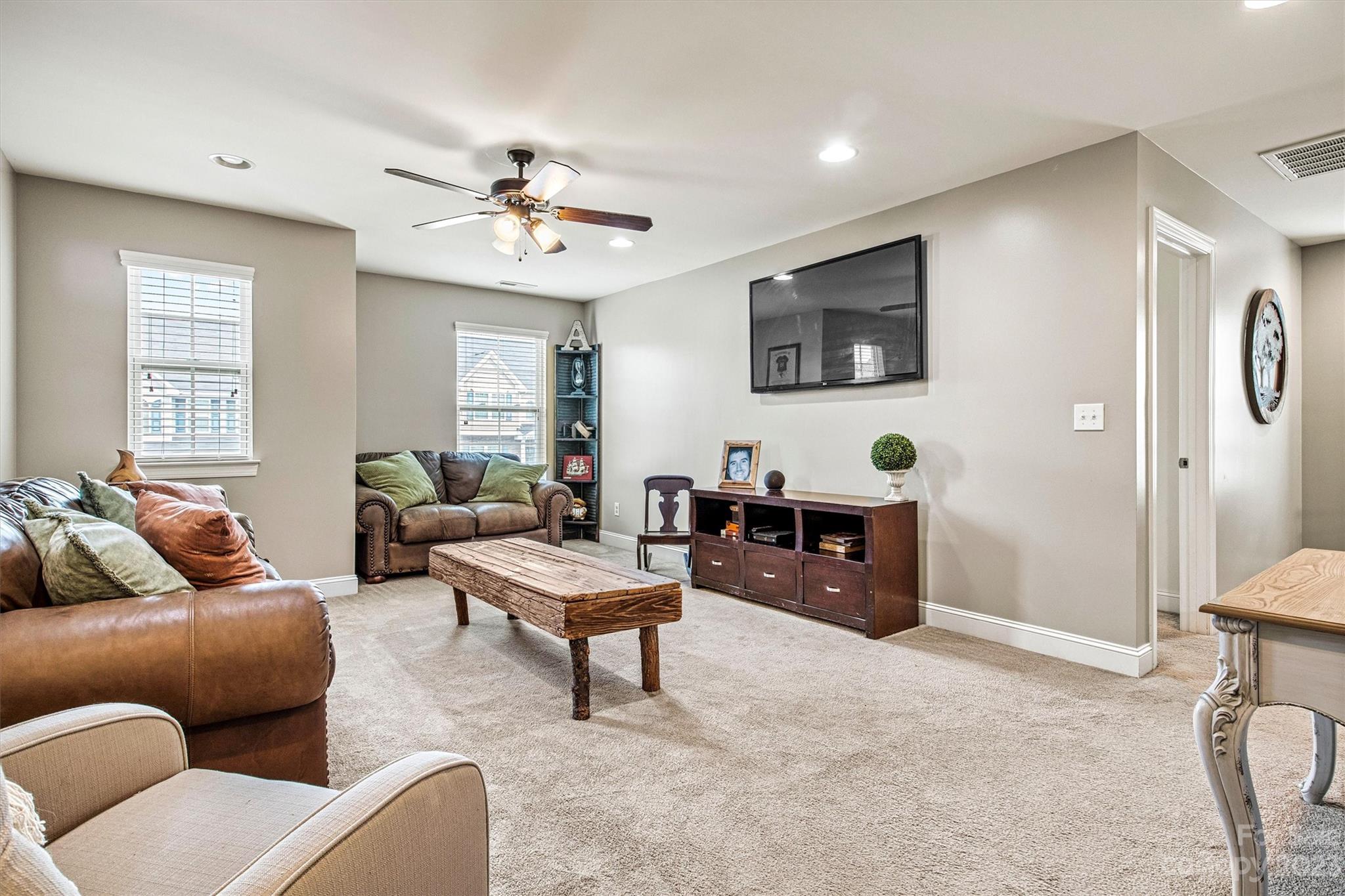 6054 Durango Way Denver, NC 28037 - Photo 23 of 38 a living room with furniture and a window