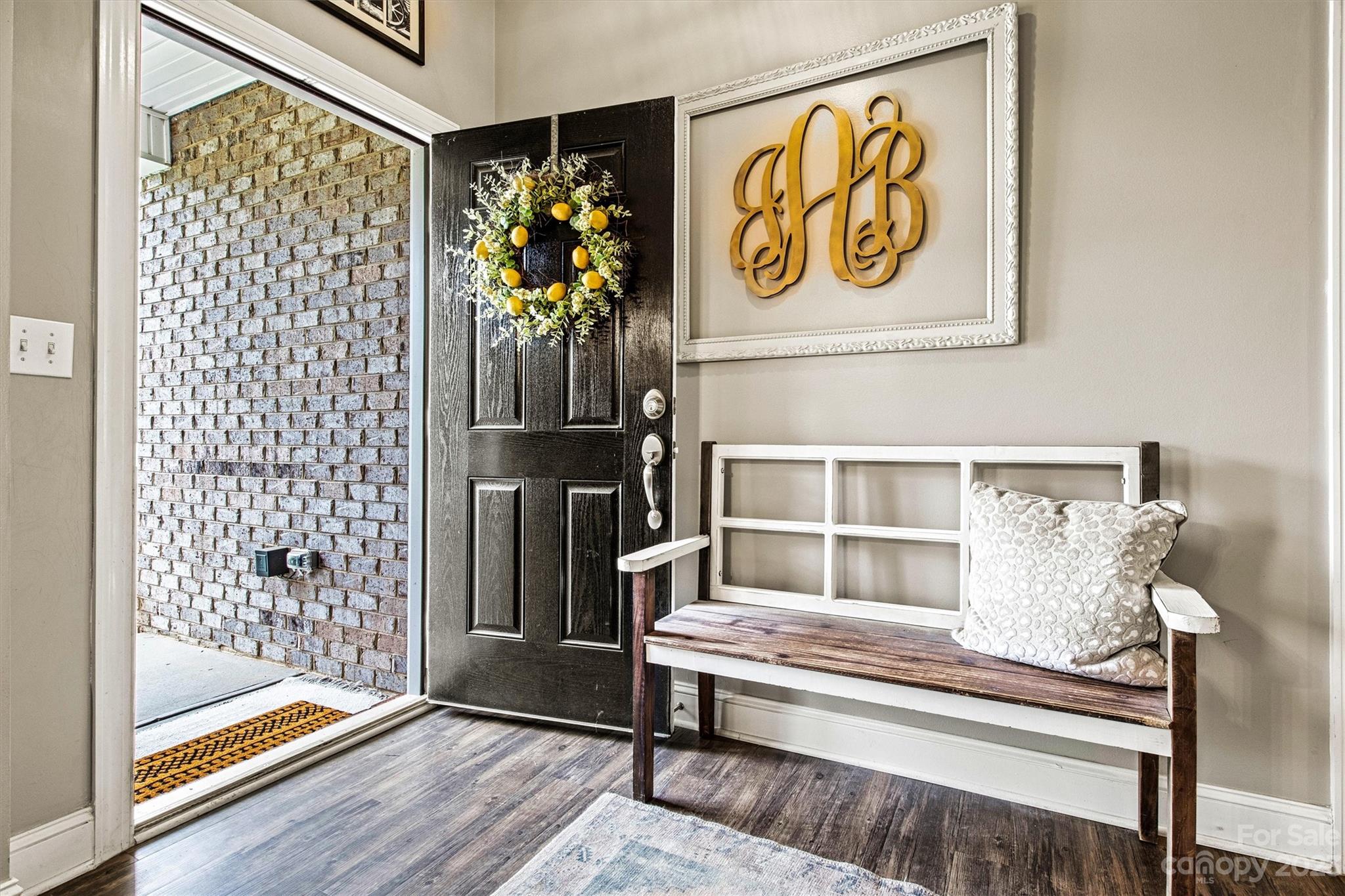 6054 Durango Way Denver, NC 28037 - Photo 3 of 38 a view of a entryway door with wooden floor