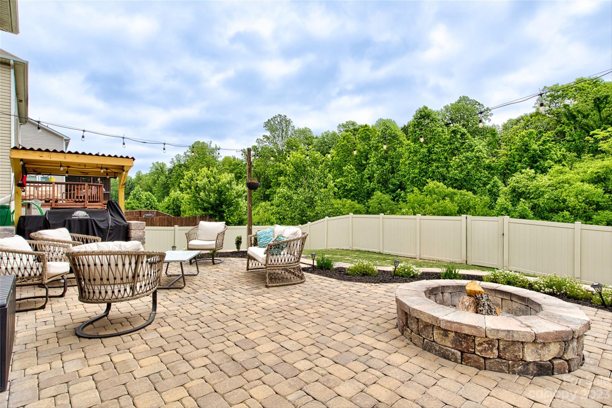 6054 Durango Way Denver, NC 28037 - Photo 35 of 38 a view of a chair and table in backyard