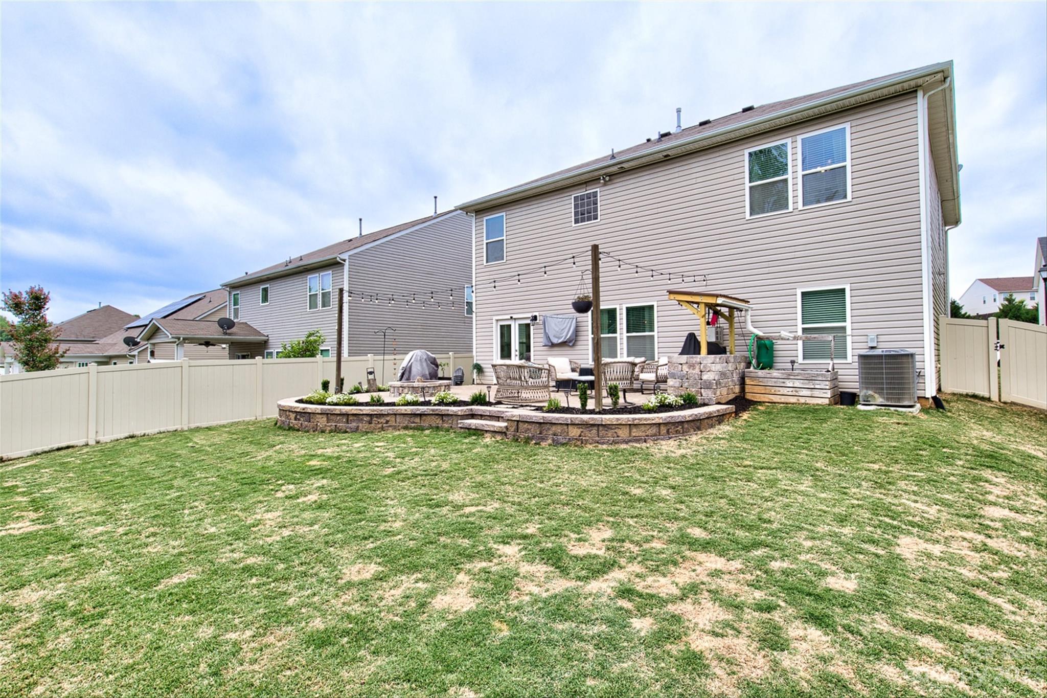 6054 Durango Way Denver, NC 28037 - Photo 38 of 38 a view of a house with backyard swimming pool and sitting area