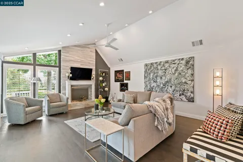 a kitchen with center island wooden cabinets and stainless steel appliances