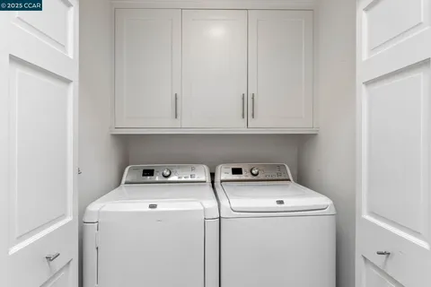 an aerial view of a house with a swimming pool