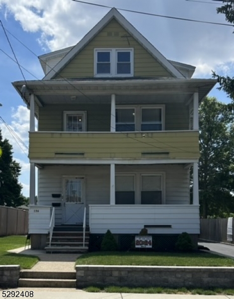 136 Carlton Avenue, Unit 1 East Rutherford, NJ 07073 - Photo 16 of 16 a front view of a house