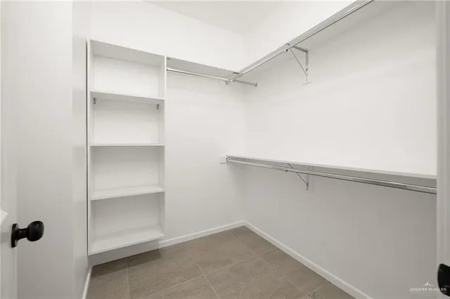 a view of an empty walk in closet