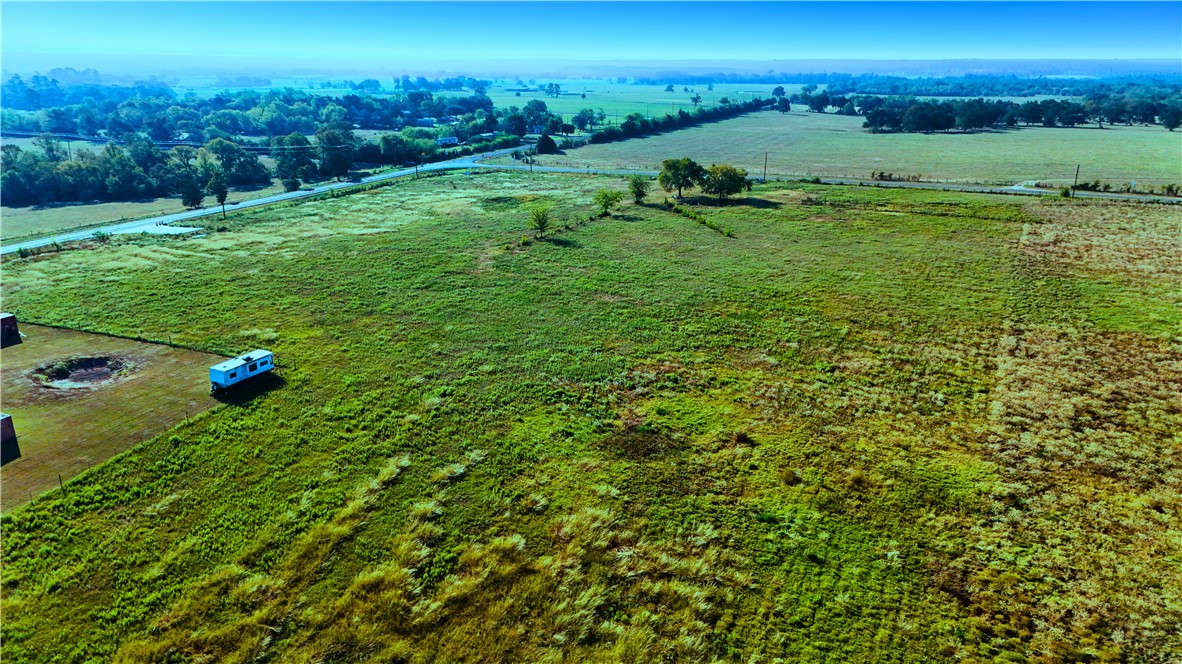 6015 Farm To Market 1486, Unit COUNTYROAD Richards, TX 77873 - Photo 4 of 6 a view of a field with an ocean