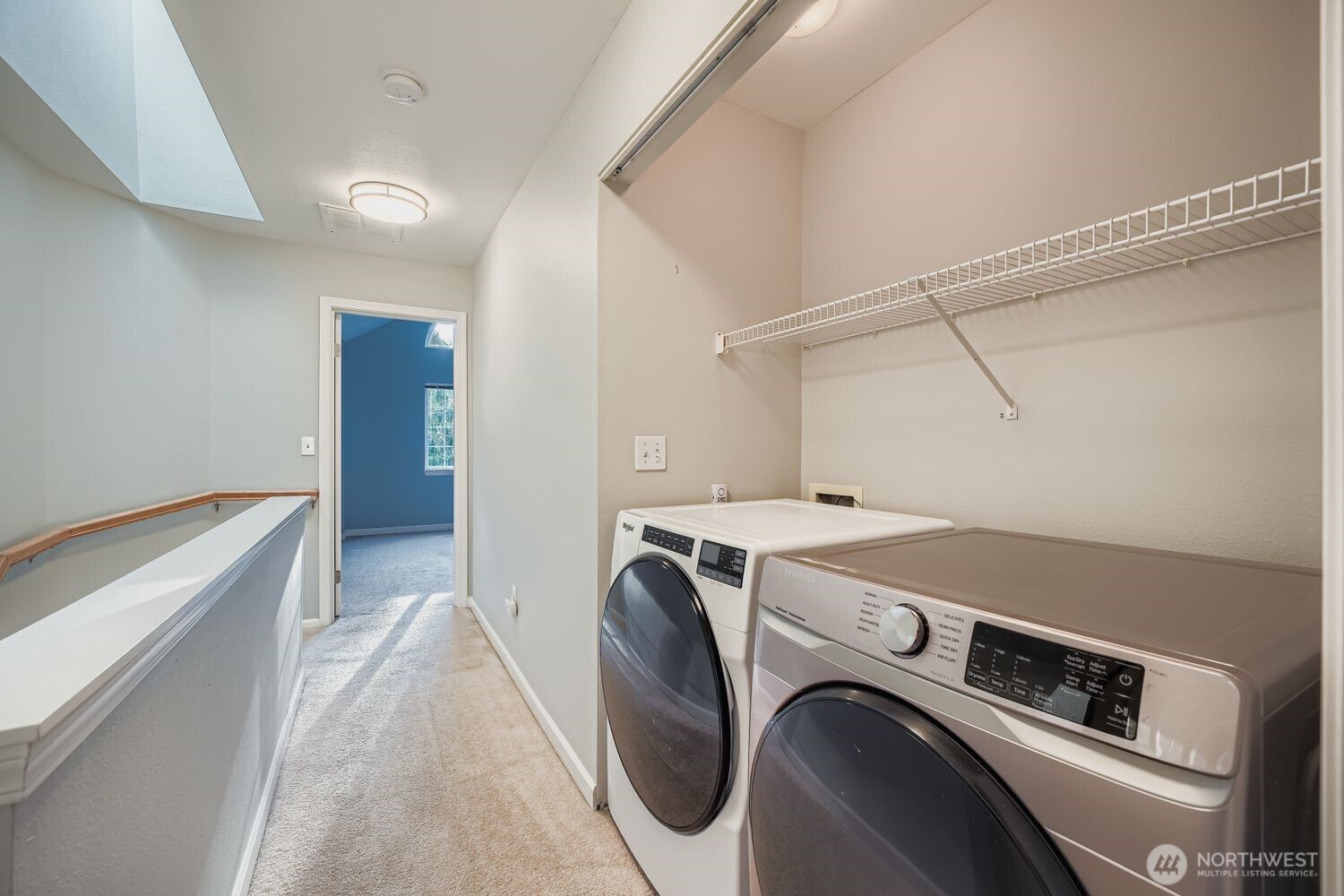 601 12th Avenue Northwest, Unit C1 Issaquah, WA 98027 - Photo 24 of 28 a utility room with dryer and washer