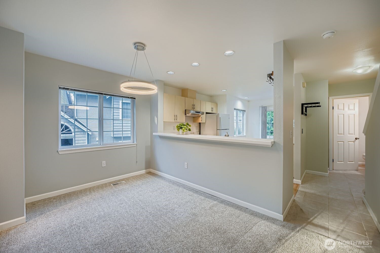 601 12th Avenue Northwest, Unit C1 Issaquah, WA 98027 - Photo 8 of 28 a view of an empty room with a window