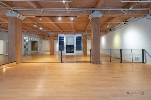 a view of a hall with an empty room