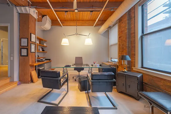 a view of a room with storage and utility room
