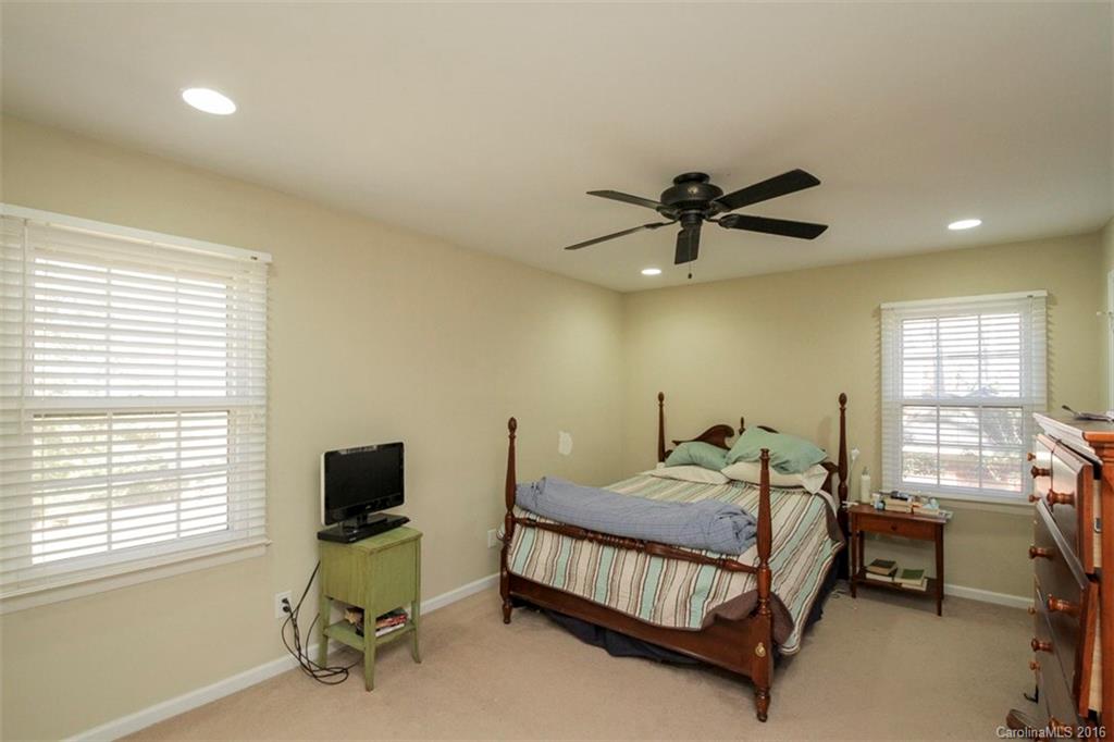 10212 Sardis Oaks Road Charlotte, NC 28270 - Photo 15 of 24 a bedroom with a bed and a window