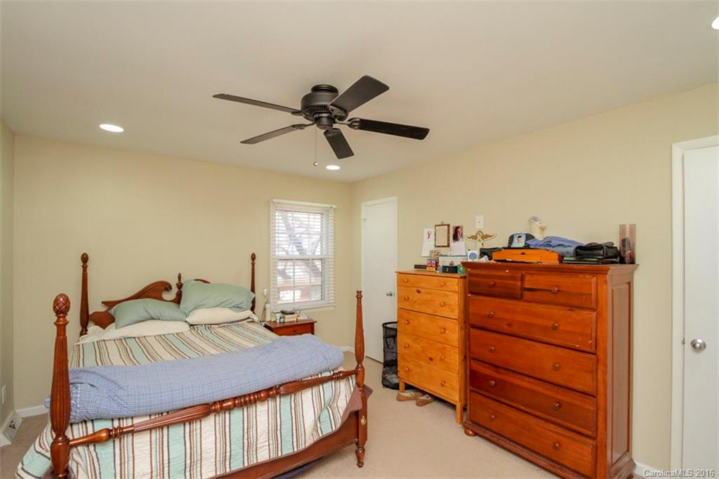 10212 Sardis Oaks Road Charlotte, NC 28270 - Photo 16 of 24 a bedroom with a bed and a window