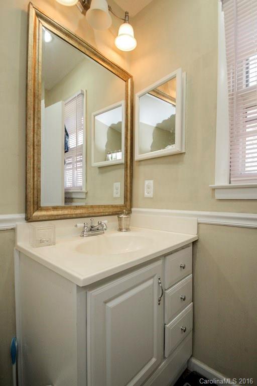 10212 Sardis Oaks Road Charlotte, NC 28270 - Photo 18 of 24 a bathroom with a sink and a mirror