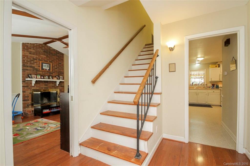 10212 Sardis Oaks Road Charlotte, NC 28270 - Photo 3 of 24 a view of entryway and hall with wooden floor