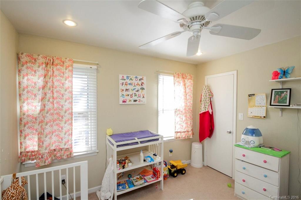 10212 Sardis Oaks Road Charlotte, NC 28270 - Photo 21 of 24 a bedroom with a bed and a window