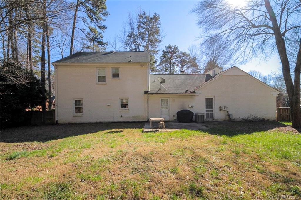 10212 Sardis Oaks Road Charlotte, NC 28270 - Photo 24 of 24 a view of a house with backyard and sitting area