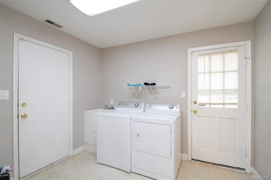 10212 Sardis Oaks Road Charlotte, NC 28270 - Photo 7 of 24 a utility room with dryer and washer