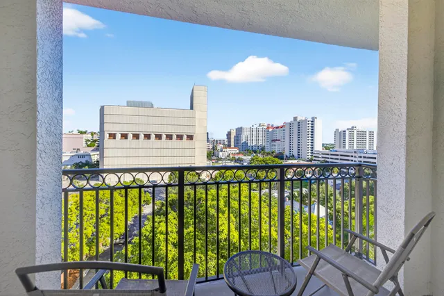 a view of a balcony with an outdoor space
