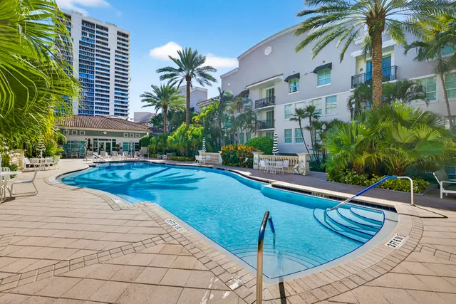 a view of a swimming pool with a patio
