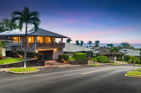 a view of a house with swimming pool and porch
