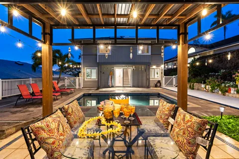 a view of a swimming pool with a patio