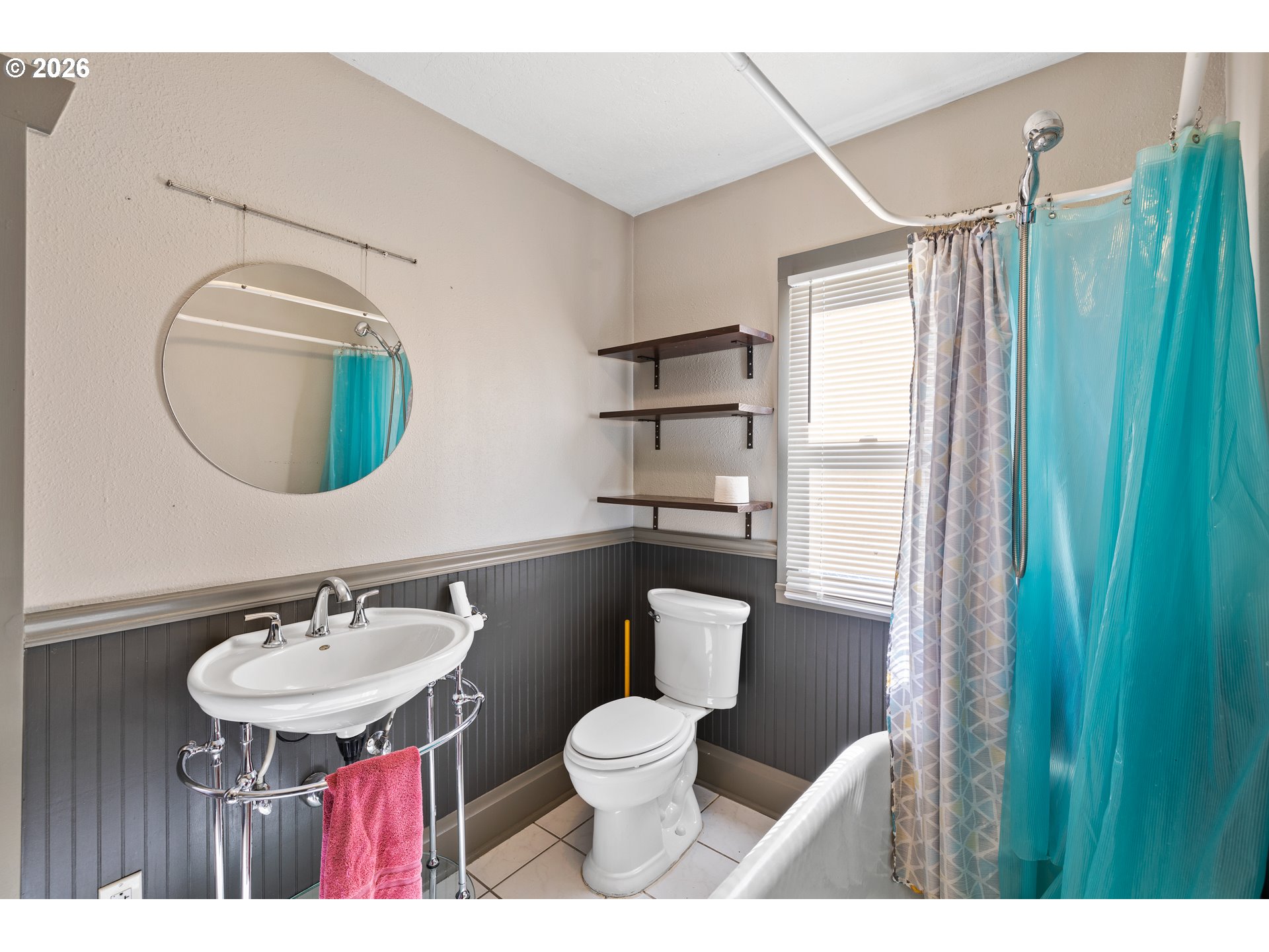 1115 Shipping Street Northeast Salem, OR 97301 - Photo 18 of 24 a bathroom with a toilet sink and mirror