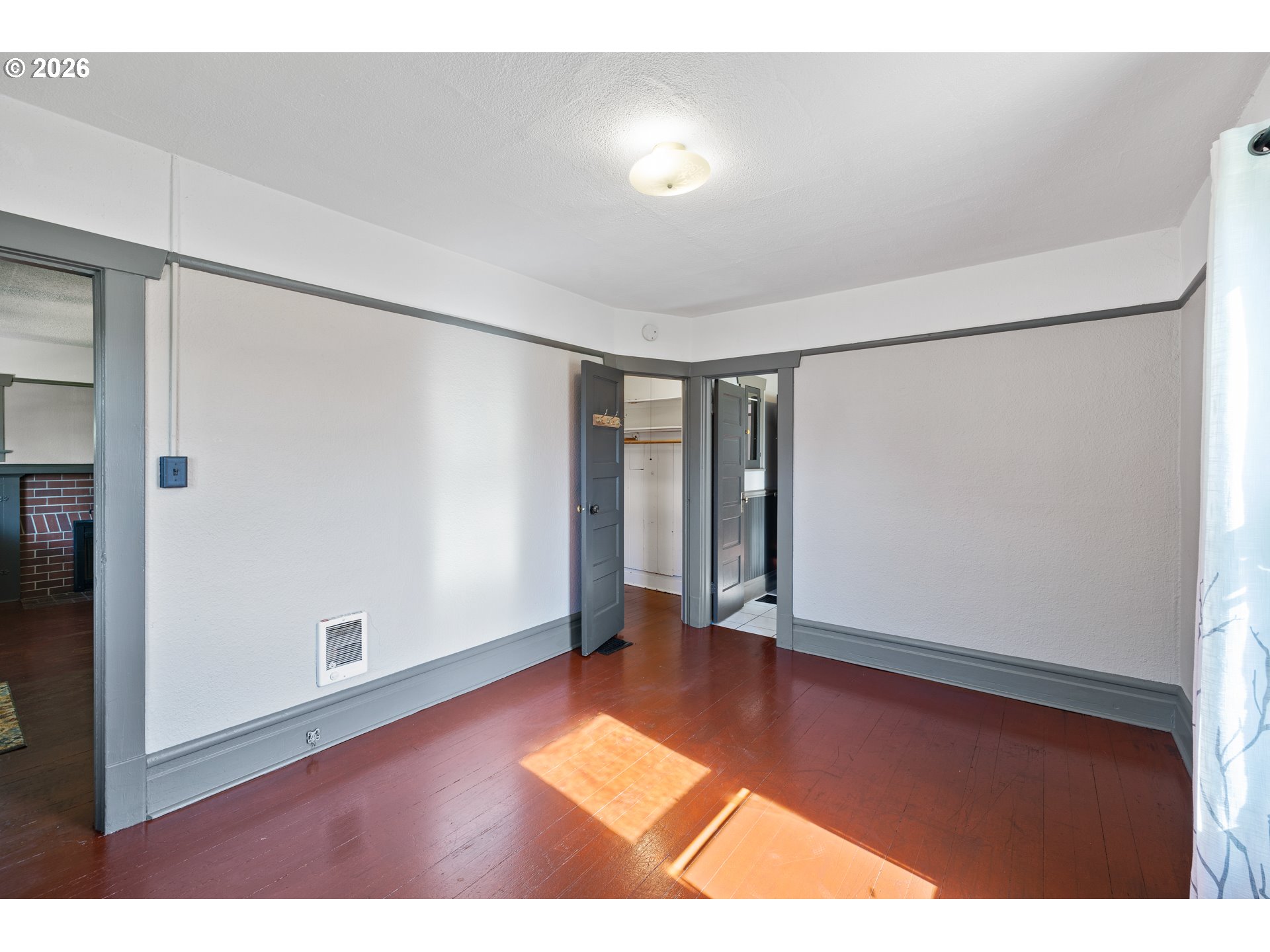 1115 Shipping Street Northeast Salem, OR 97301 - Photo 20 of 24 a view of an empty room with wooden floor