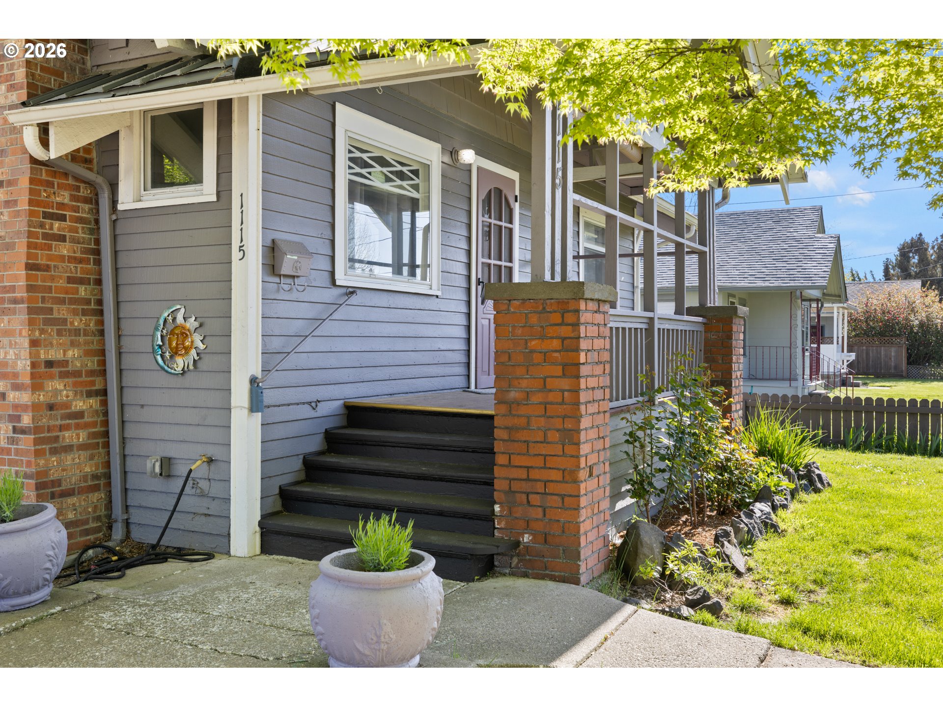 1115 Shipping Street Northeast Salem, OR 97301 - Photo 3 of 24 a front view of a house with a garden