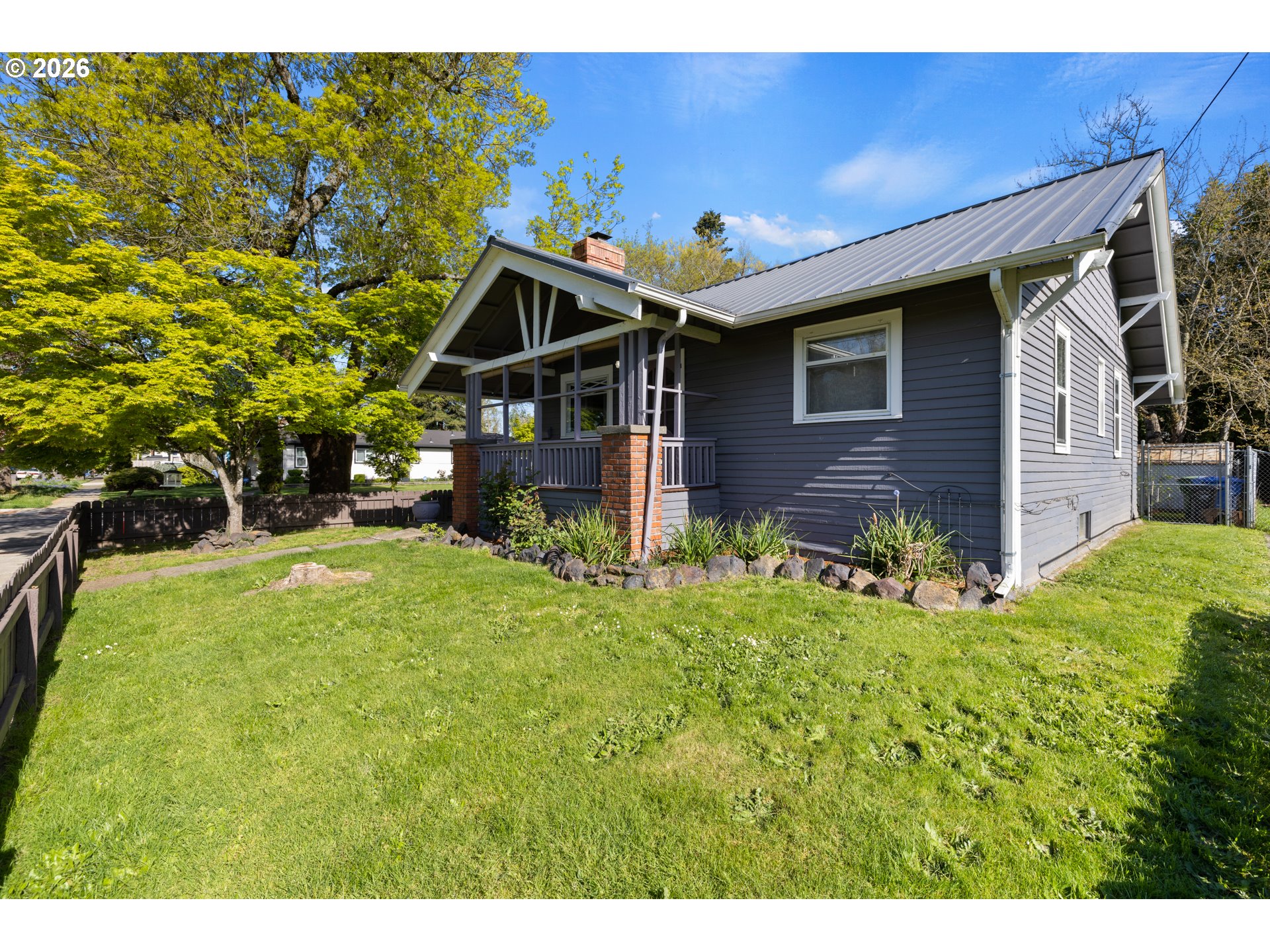 1115 Shipping Street Northeast Salem, OR 97301 - Photo 6 of 24 a front view of a house with a yard