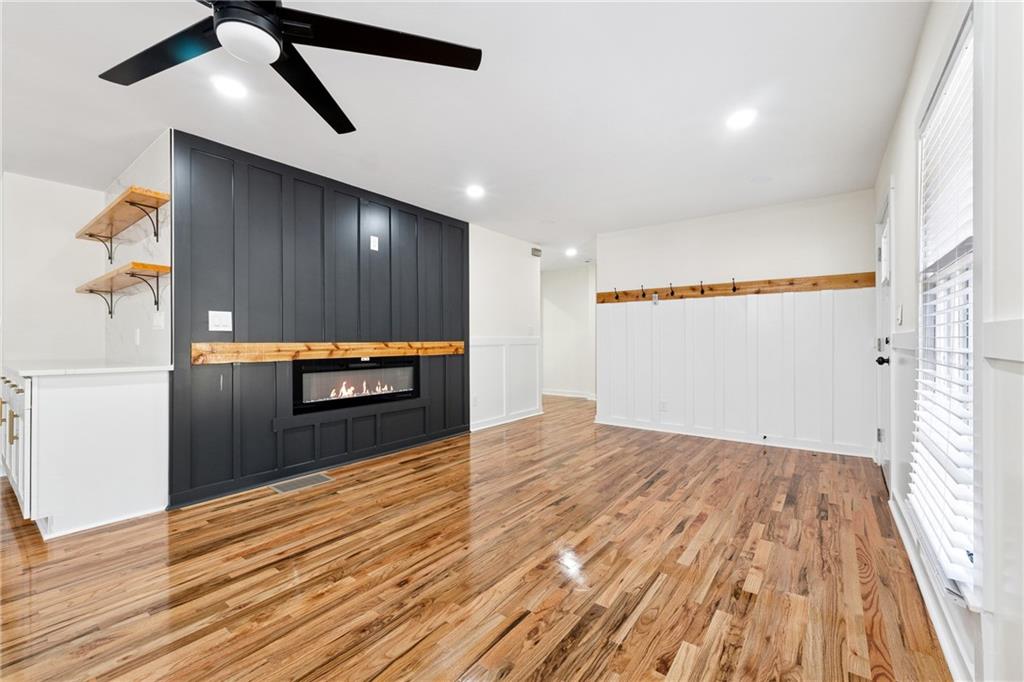 2055 Oak Road Southwest Snellville, GA 30078 - Photo 7 of 33 a view of a livingroom with wooden floor
