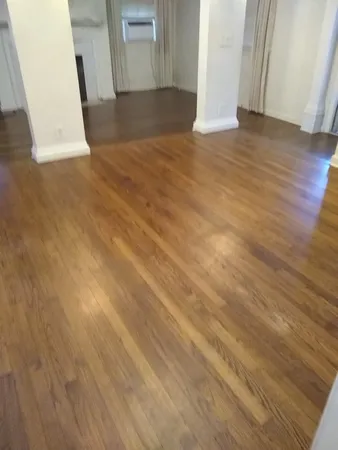 a view of wooden floor and staircase