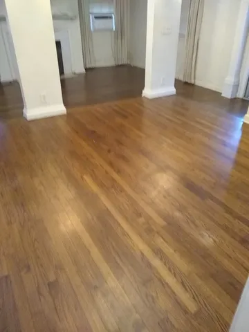 a view of wooden floor and staircase