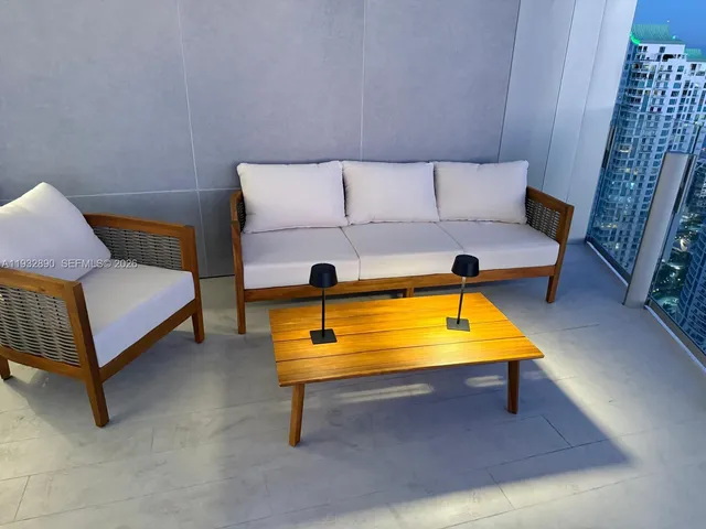 a living room with a couch and a table