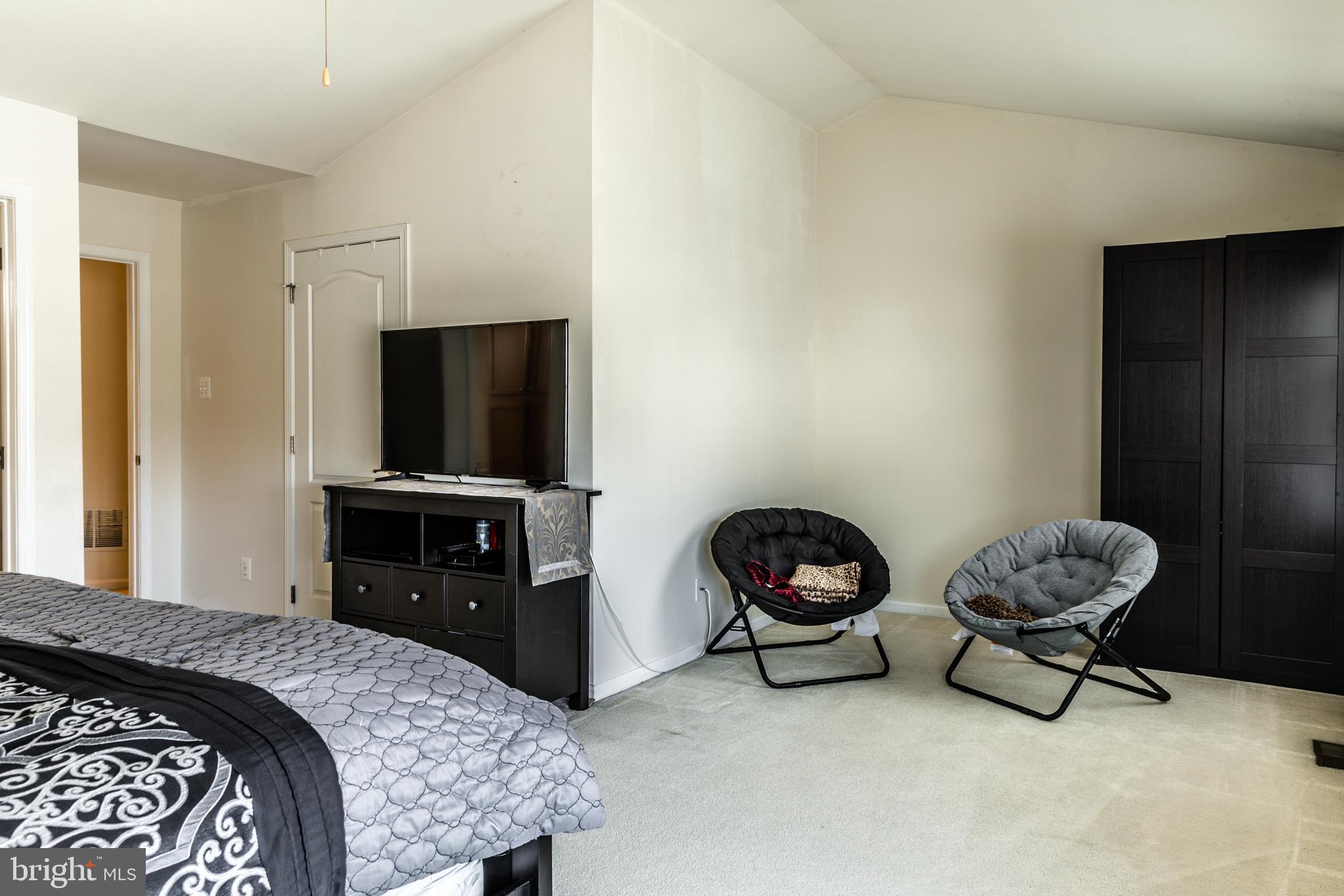 108 Eagleview Terrace Mount Royal, NJ 08061 - Photo 17 of 24 a bedroom with a bed and a chair