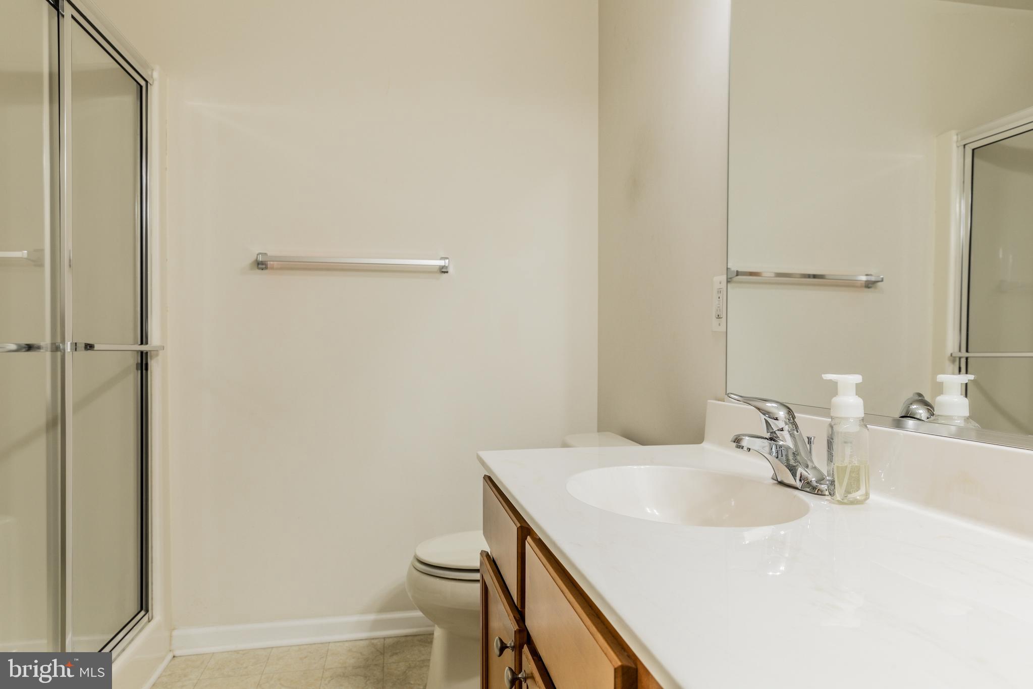 108 Eagleview Terrace Mount Royal, NJ 08061 - Photo 20 of 24 a bathroom with a sink and a mirror