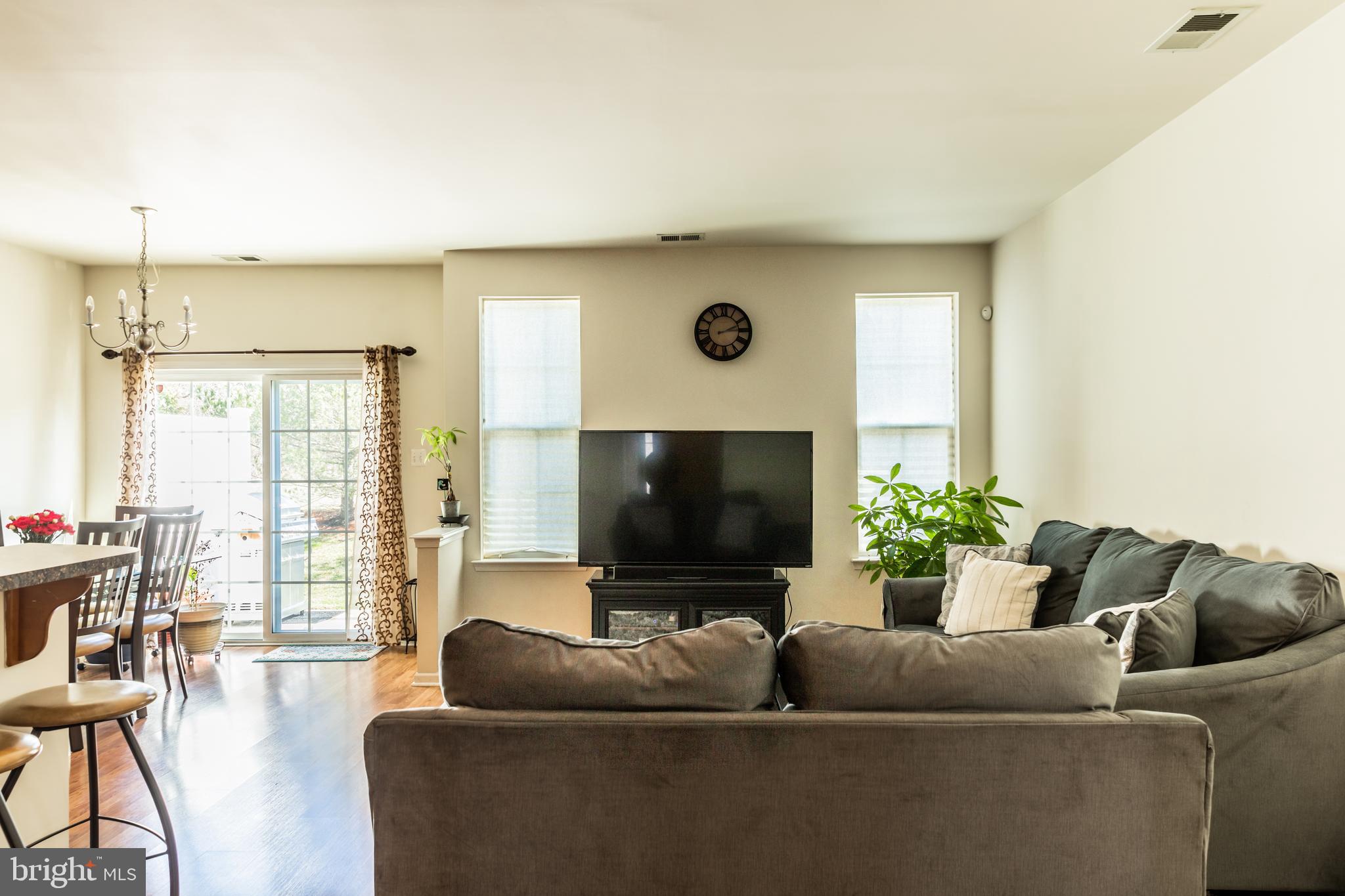 108 Eagleview Terrace Mount Royal, NJ 08061 - Photo 4 of 24 a living room with furniture and a flat screen tv